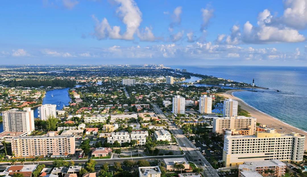 A stress-free individual reviewing their lower monthly payment after debt consolidation.