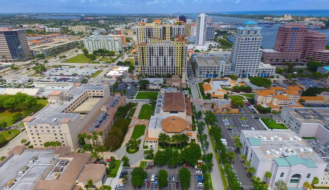 A client reviewing their new lower monthly payment after debt consolidation.