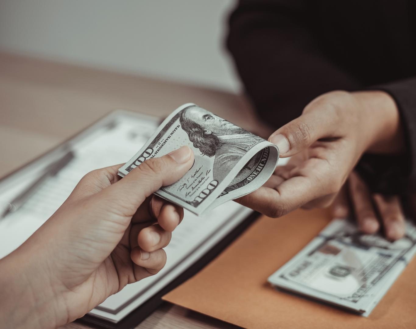 Client reviewing monthly budget under payment relief near me in Hialeah, FL