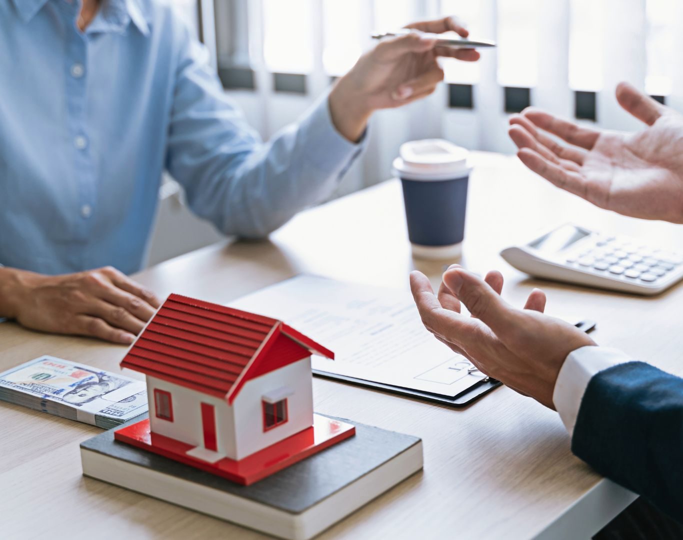 Client reviewing repayment options for debt consolidation near me in Flushing, NY