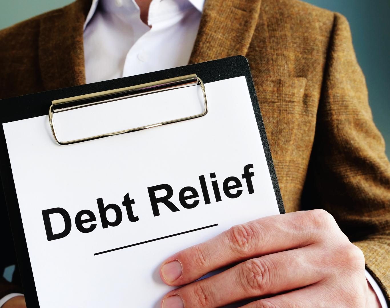 Financial advisor discussing debt relief in California during a client consultation