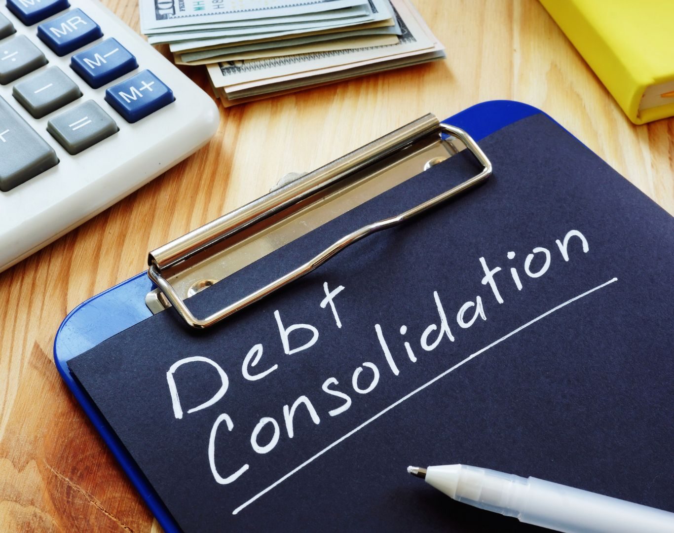 Financial advisor explaining debt consolidation in Park Slope, NY during a client consultation