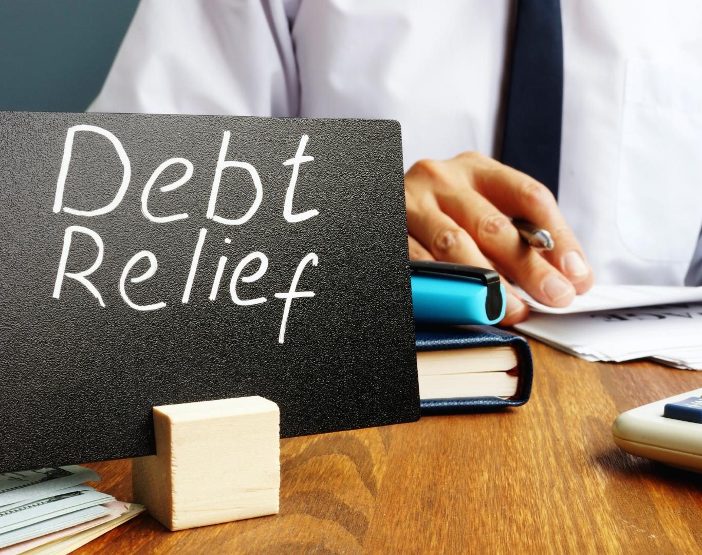 Resident reviewing options for debt relief near me in Palm Harbor, FL