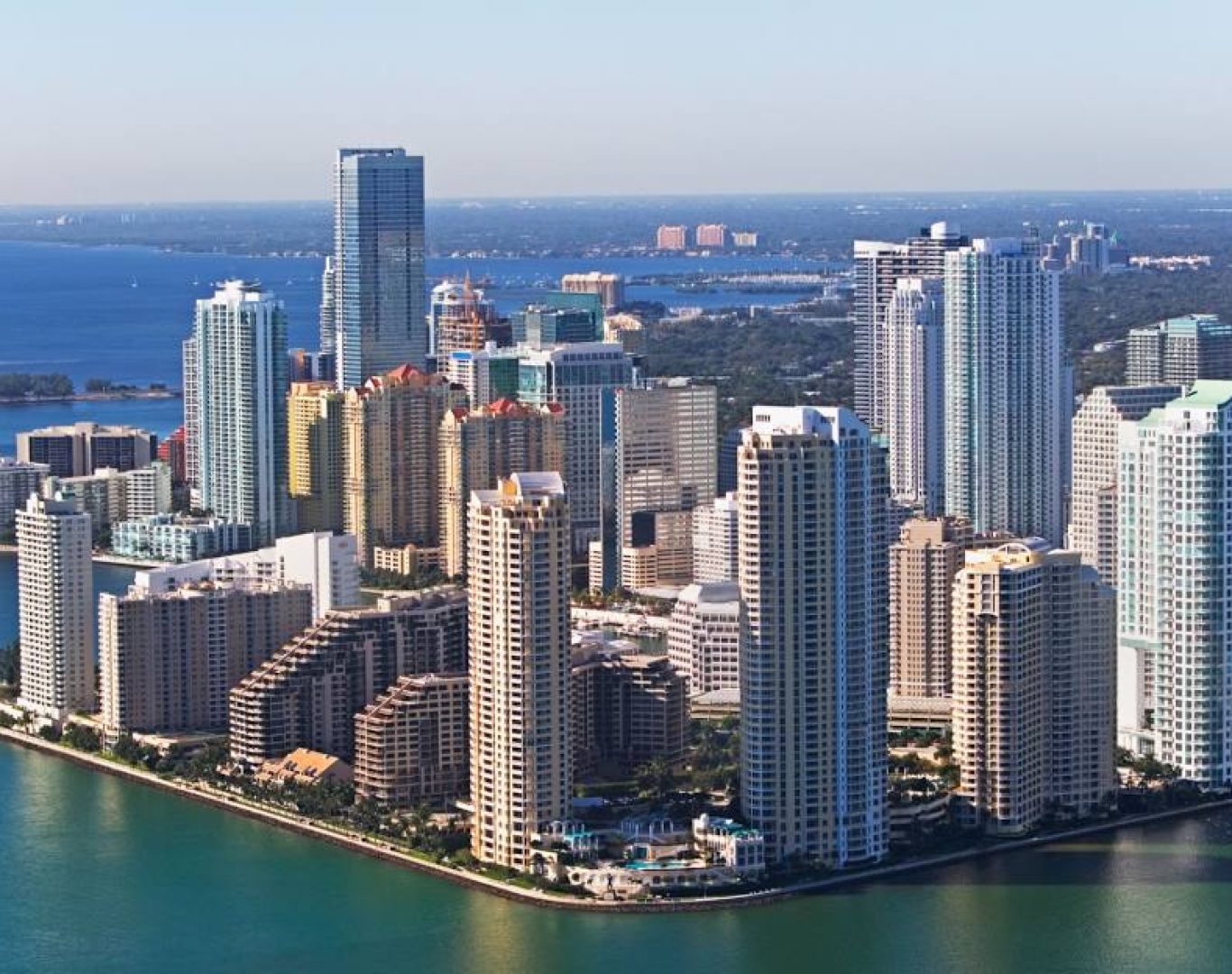 A financial expert at Greenwise Financial Solutions reviewing a debt consolidation plan with a client.